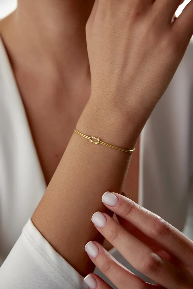 Love Knot Bracelet. Minimal Snake Chain Designer Bracelet. UNISEX gold plated High quality Sterling silver Jewelry for a meaningful timeless gift! (Gold)